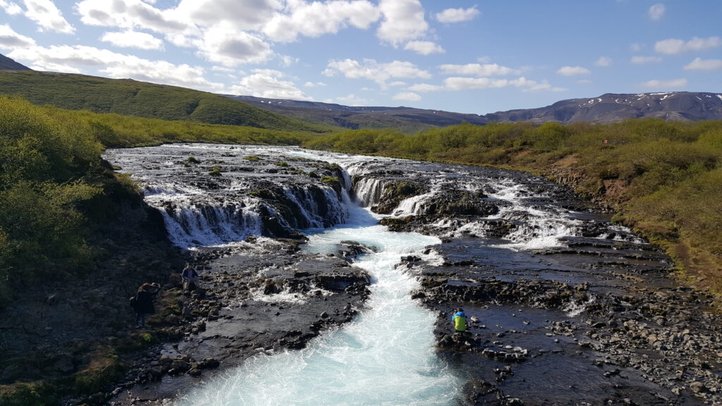 A river with rapids in Iceland on a sunny day